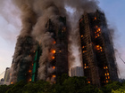 Fire rages through Hong Kong high-rise residential complex, killing 13
